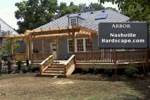 Nashville Arbor and in this image is a Pergola attached to a home that was a part of an overall design for the property in the back yard.