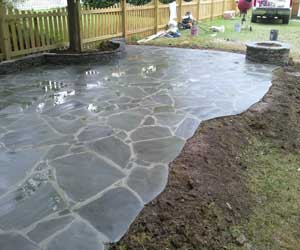 Spring Hill Tn patios gray flagstone patio wall and fire pit
