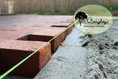 Nashville Brick Paver Patio Company installer of brick paver patios. This is an image of a brick patio being installed.