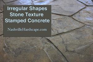 Irregular shaped stone stamped concrete gray brown with sealer and dye